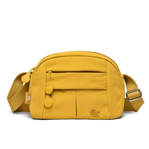 Detail of a ginger yellow nylon crossbody bag with MS logo and adjustable shoulder strap
