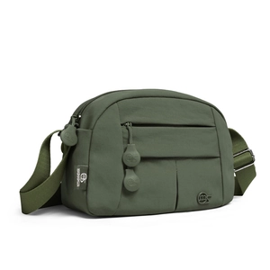 Detail view of military green nylon crossbody bag with multi-layer zippers and logo