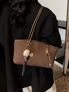 Retro large capacity dark coffee tote bag with suede texture and plush charm for work