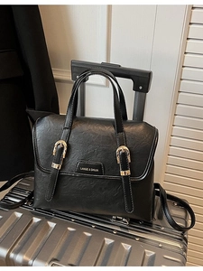 Vintage black leather multi-functional backpack and shoulder bag with gold hardware buckles