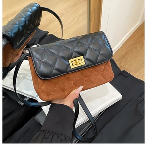 Detail of crossbody bag with black quilted leather and brown suede dual-tone patchwork