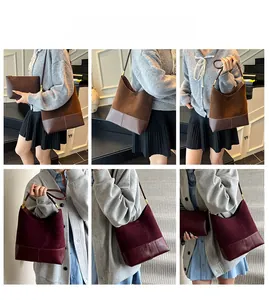 Detailed view of vintage faux suede tote and matching pouch set in coffee brown and burgundy