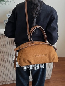 Retro brown suede pillow bag with PANTOCR logo and side fringe details for women