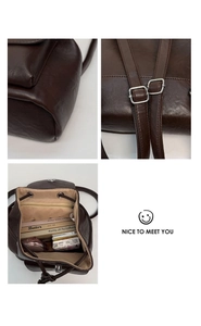 Detailed macro view showing the premium dark brown leather texture and silver buckle of the backpack