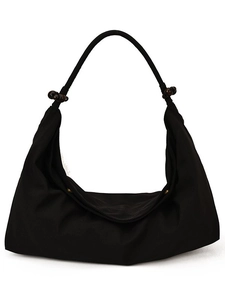 Sac hobo noir en toile avec bandoulière perlée et fermeture magnétique