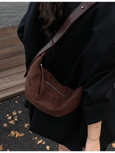 Brown matte crescent crossbody bag with adjustable wide strap for autumn fashion style