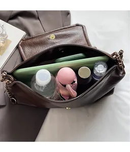 Interior view of large retro dark brown tote bag showing spacious room for essentials