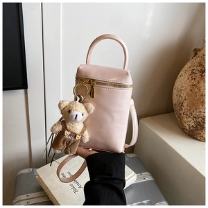 Petit sac à main rose en cuir PU avec pendentif ours en peluche et zip doré élégant