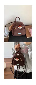 Macro detail of brown corduroy mini backpack featuring cute cartoon dog patch and wooden buttons