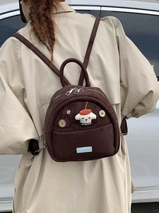 Mini retro brown corduroy backpack for women featuring a cute puppy face and wooden buttons