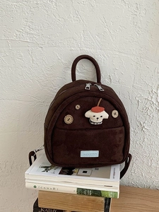 Vintage brown suede mini backpack with dog embroidery and wooden buttons on books