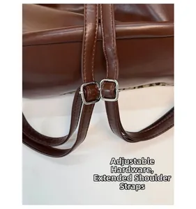 Detail of adjustable leather strap with silver buckle and leopard print pattern