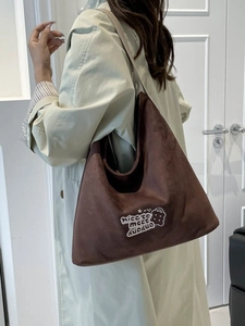 Large capacity leopard print suede tote bag with embroidery shown on model