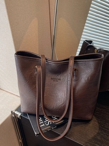 Brown leather tote bag with fashion bag NEW YORK embossing and long shoulder straps
