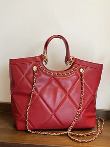 Red quilted leather tote bag with gold chain strap and elegant rhombus pattern for women