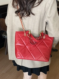 Elegant red quilted tote bag with golden chain strap for women, casual and office style