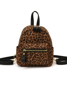 Leopard print mini backpack with golden metal zippers on a clean white background