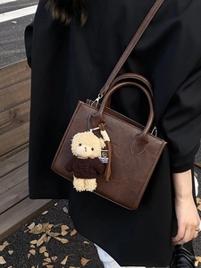 Retro brown PU leather tote bag with cute plush bear charm for autumn fashion