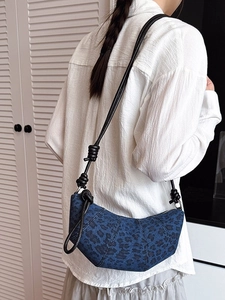 Blue leopard print crescent crossbody bag with woven knot shoulder strap for women