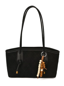 Retro black quilted tote bag with matte texture and decorative wooden bead tassel pendant