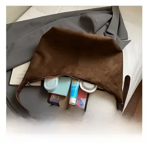 Internal view of brown large suede tote bag showing capacity for daily essentials