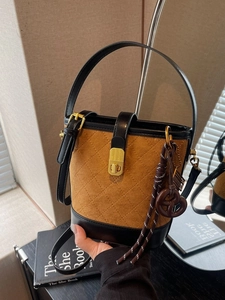 Maillard vintage quilted bucket bag in brown suede with black leather trim and gold lock