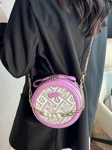 Minimalist lilac round crossbody bag with geometric embroidery and pearl chain strap