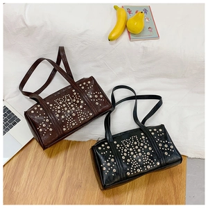 Top view of retro punk rivet handbags in black and coffee brown textured faux leather