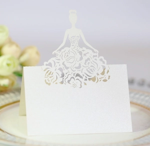 Detailed laser-cut white wedding place card with elegant bride silhouette and rose pattern