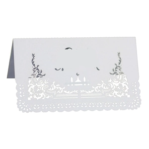 White laser cut place card with architectural silhouette and lace pattern for tables