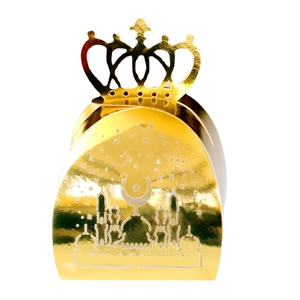 Golden hollow laser cut favor box with moon and star design and crown handle for gifts