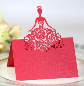 Elegant red laser-cut place card with princess silhouette and floral lace for weddings