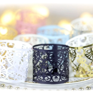 Elegant laser-cut heart pattern paper napkin rings in multiple colors for wedding decor