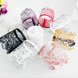 Laser-cut hollow paper tea light wraps in various metallic colors for LED candles