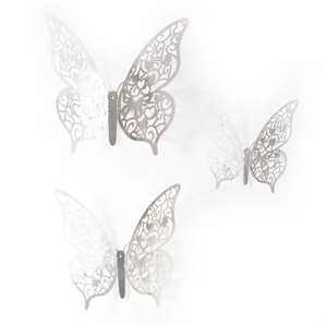 Detailed view of three-piece silver 3D hollow butterfly wall stickers in various sizes