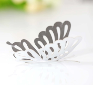 Macro shot of 3D hollow butterfly wall sticker with detailed double-layer wings