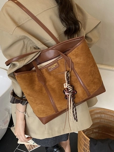 Vintage brown suede tote bag with leather straps and a cute teddy bear charm