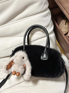 Fuzzy black faux fur crossbody bag with cute bunny pendant and leather top handles