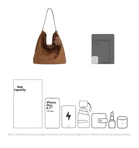 Brown suede tote bag interior capacity showing storage for phone, tablet, and accessories