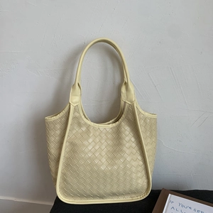 Retro woven leather hobo bag for women in cream yellow with trendy intrecciato pattern
