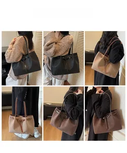 Detailed views of vintage large capacity tote bag featuring pleated texture and buckle strap