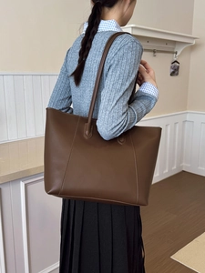 Large dark brown tote bag in faux leather with contrast white stitching for women