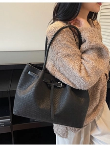 Retro black woven pattern tote bag with shoulder strap and metal buckle detail