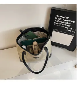 Top view of large canvas tote bag interior showing spacious capacity for daily items
