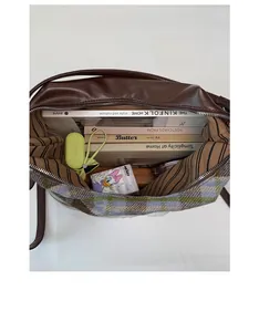 Spacious tote bag interior view showing large capacity for books and daily essentials