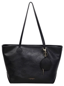 Large black vintage tote bag with pleated texture and round pendant on white background