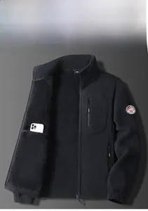 Detail of fleece jacket interior pocket showing space for a smartphone and thick fabric
