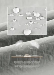 Macro detail of grey waterproof fabric with water droplets showing breathable texture