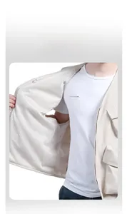 Detail view of the breathable mesh lining on this beige multi-pocket outdoor vest