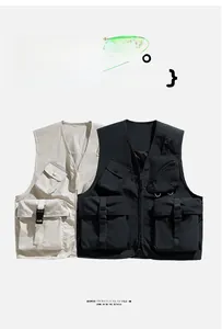 Detail of multi-pocket utility vests in beige and black with durable tactical zippers